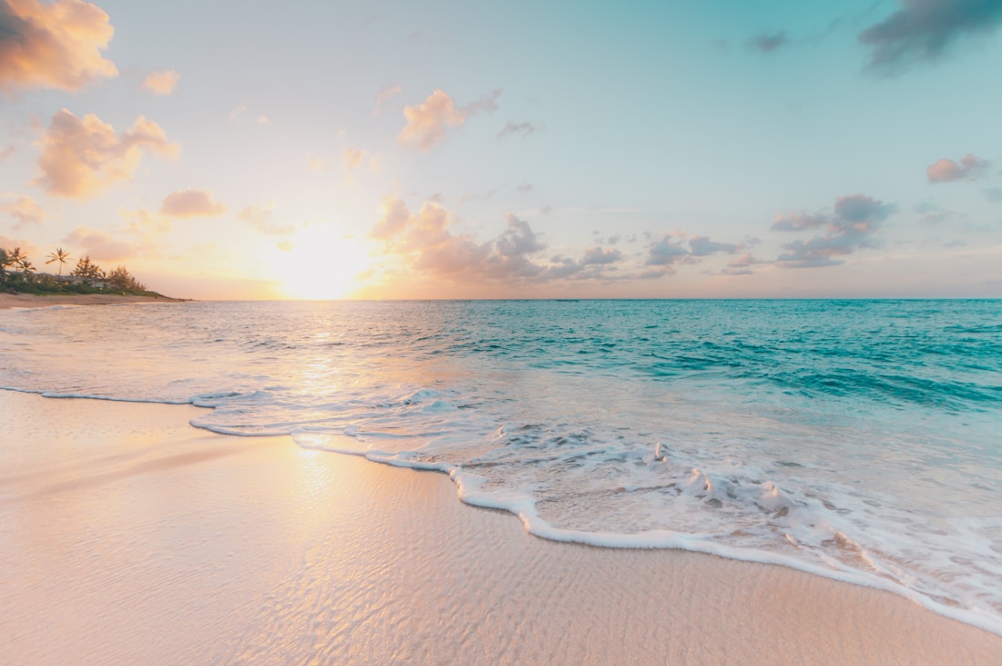A secluded beach with clear water
