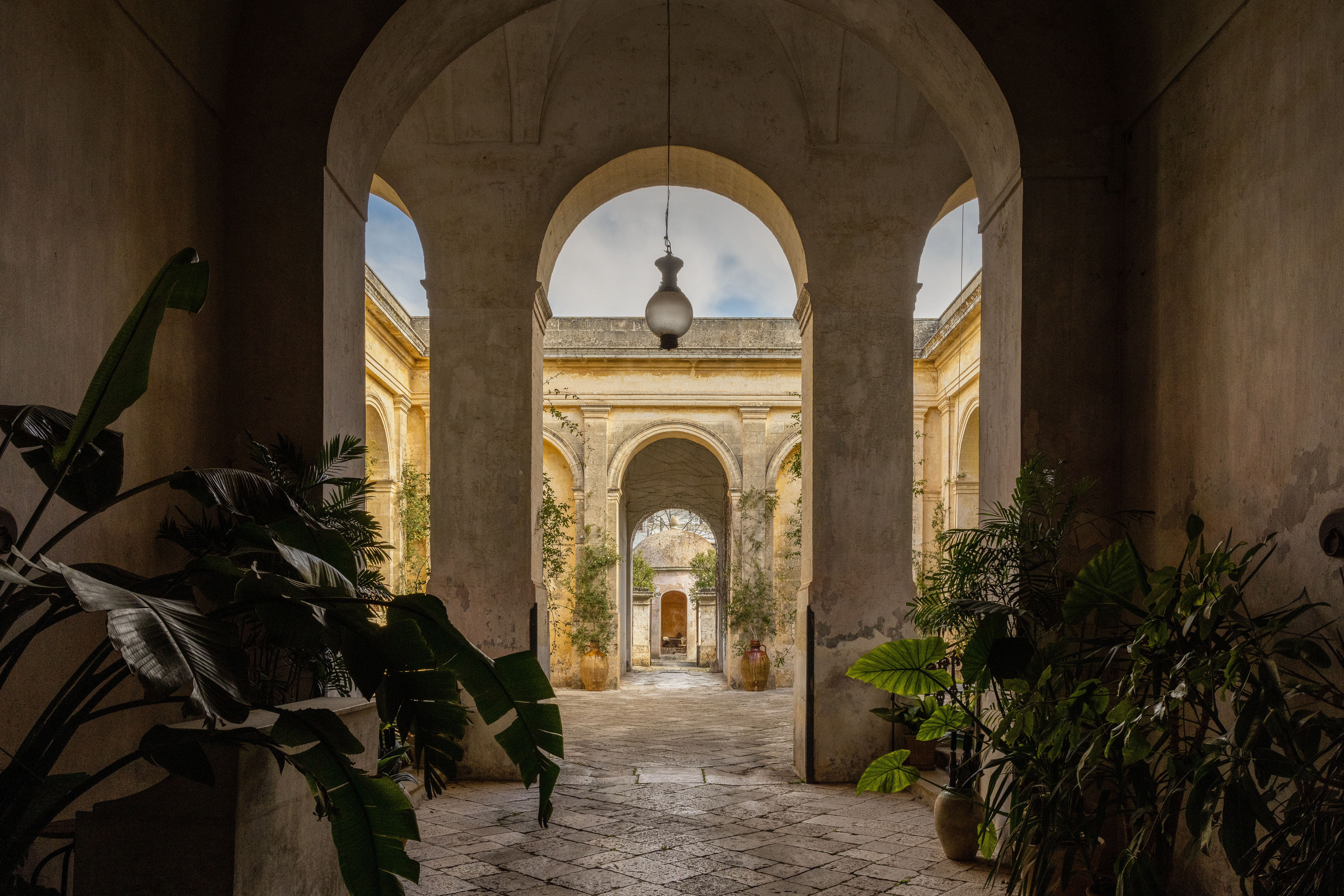 Historic courtyard and colonnade at Palazzo Daniele