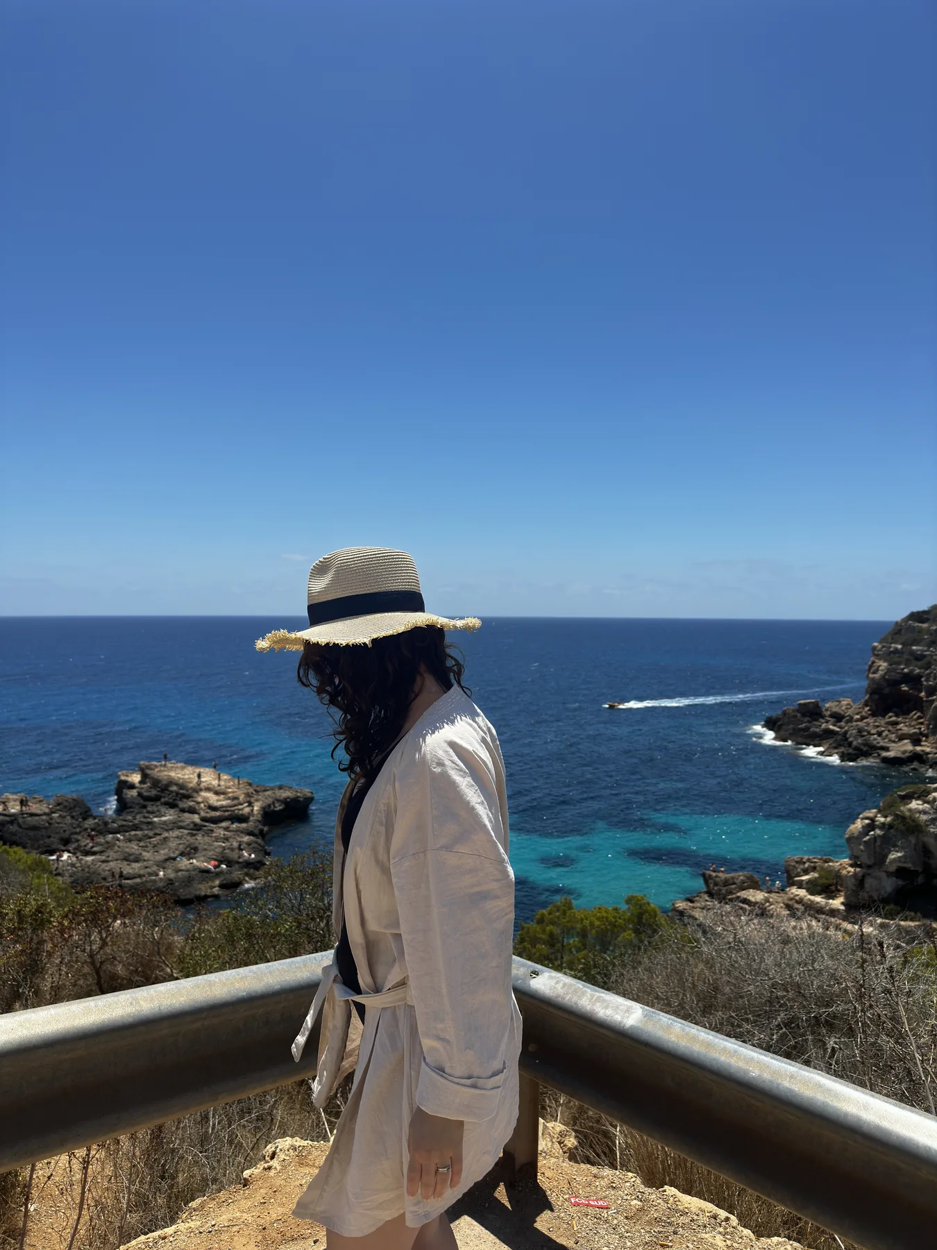Isilsu overlooking a blue coastline