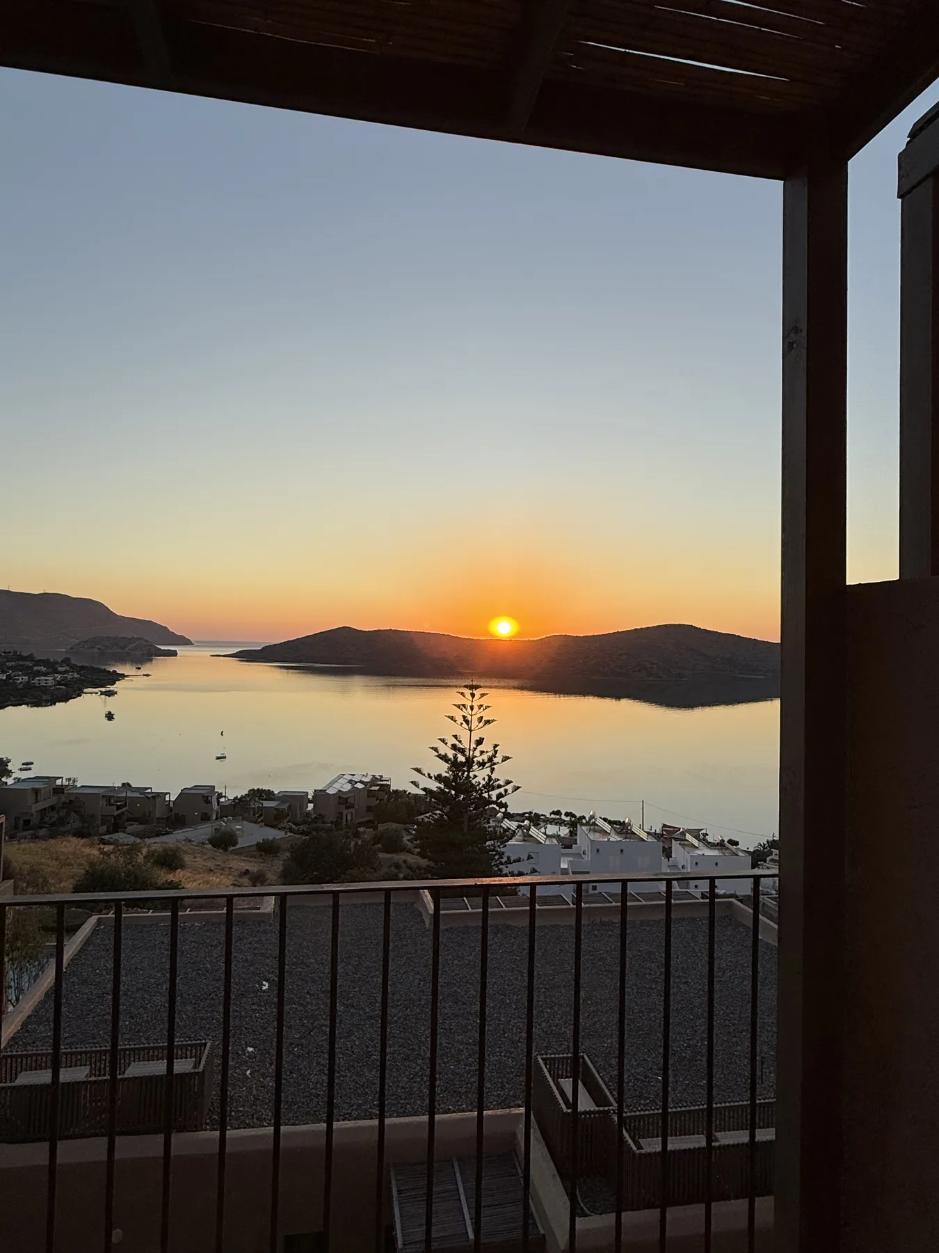 Sunset framed by a terrace overlooking the sea