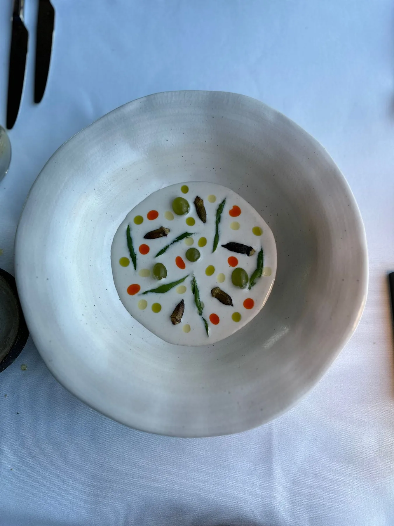 A precisely plated tasting-menu dish